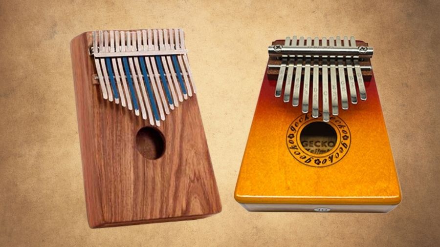 Hugh Tracey kalimba on the left and Gecko kalimba on the right, displayed side by side on a brown paper background.