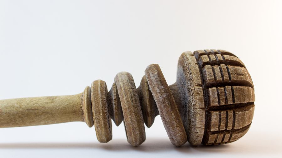 Wooden Molinillo Whisk - Traditional Mexican kitchen tool with three rings, on a white background