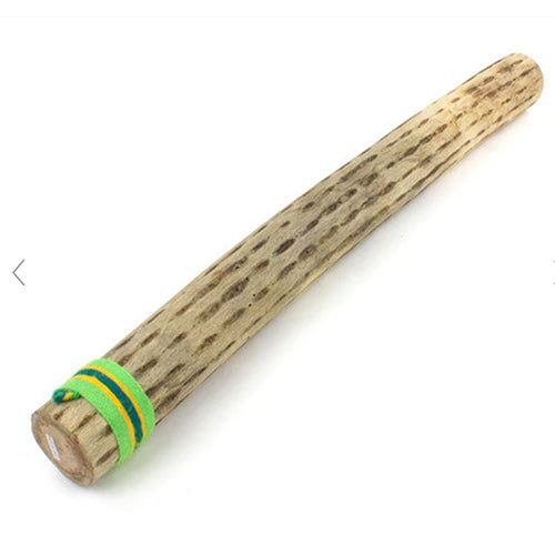 A 50cm cactus rainstick with a vibrantly colored band, made from sustainable chilean cactus as described in the product description.