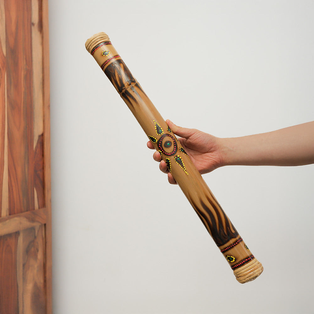 Meo finger bell, metal percussion instrument held in hand for scale