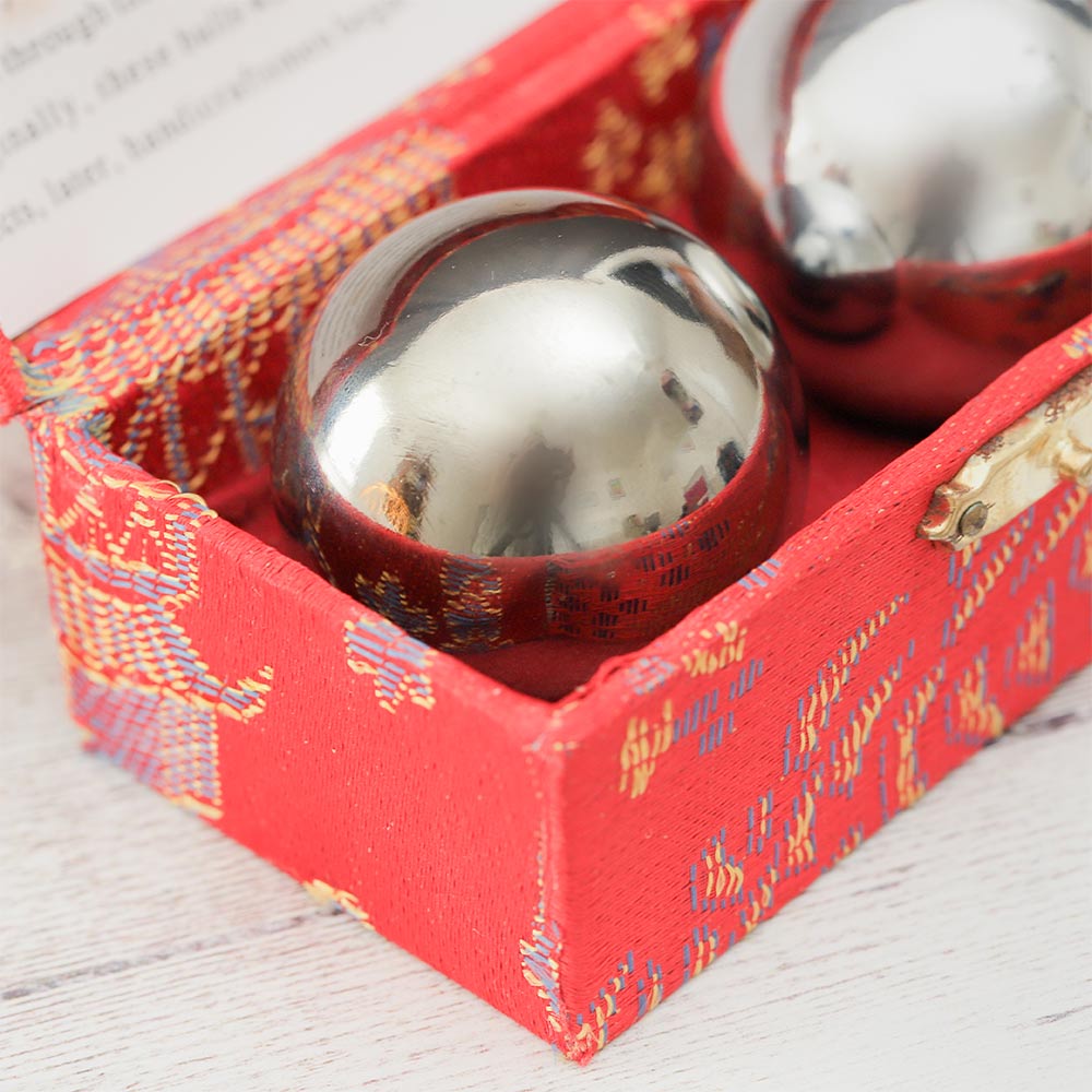 Close-up of boxed boading balls in a red box, highlighting their smooth texture and packaging.
