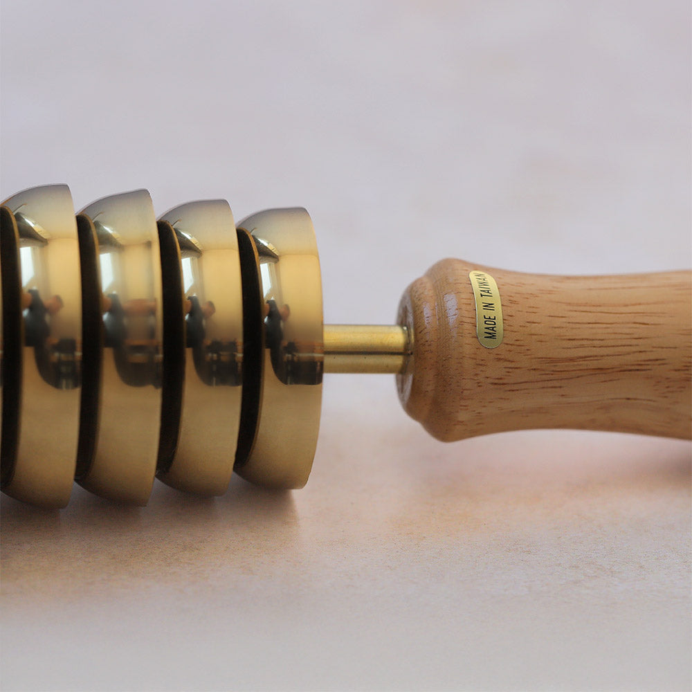 close up of chinese bell tree handle and bells