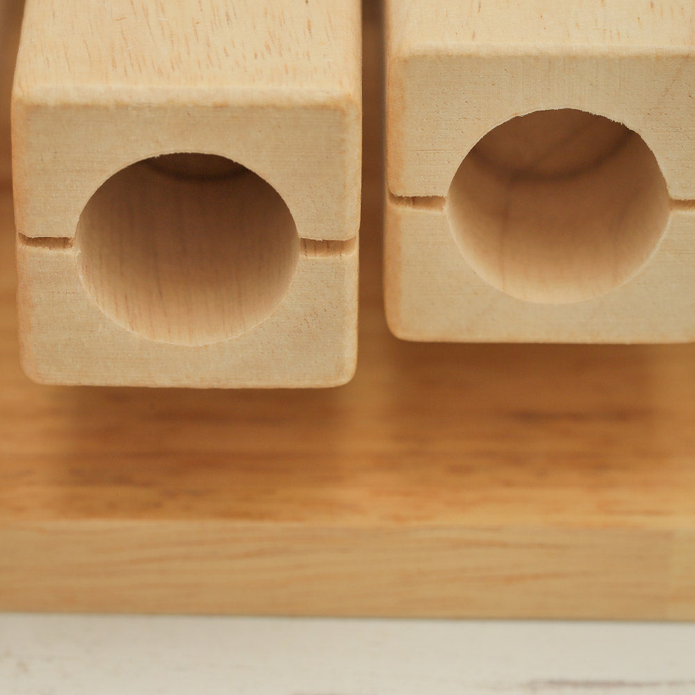 Close up of the wooden square hollow tone blocks