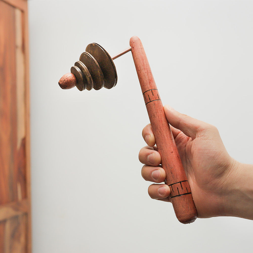 Coconut Rakatak Shaker Held in Hand