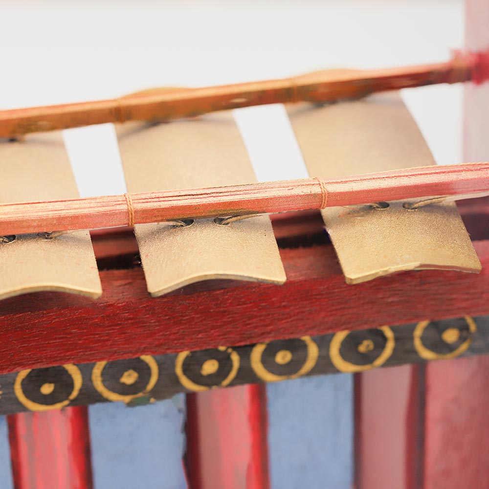 close up of metal chimes on gamelan