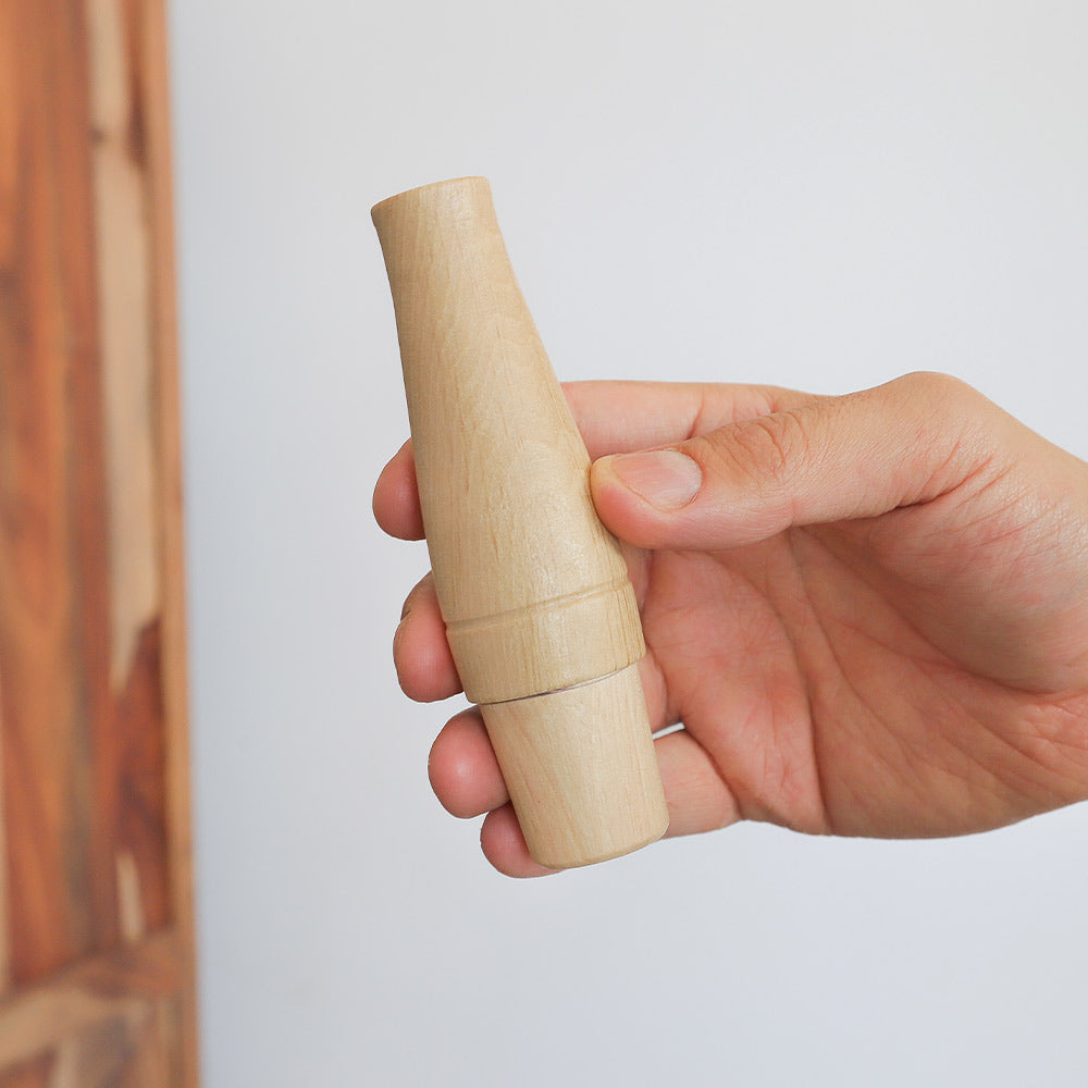 Wooden Greylag Goose Birdcall held in hand to show scale