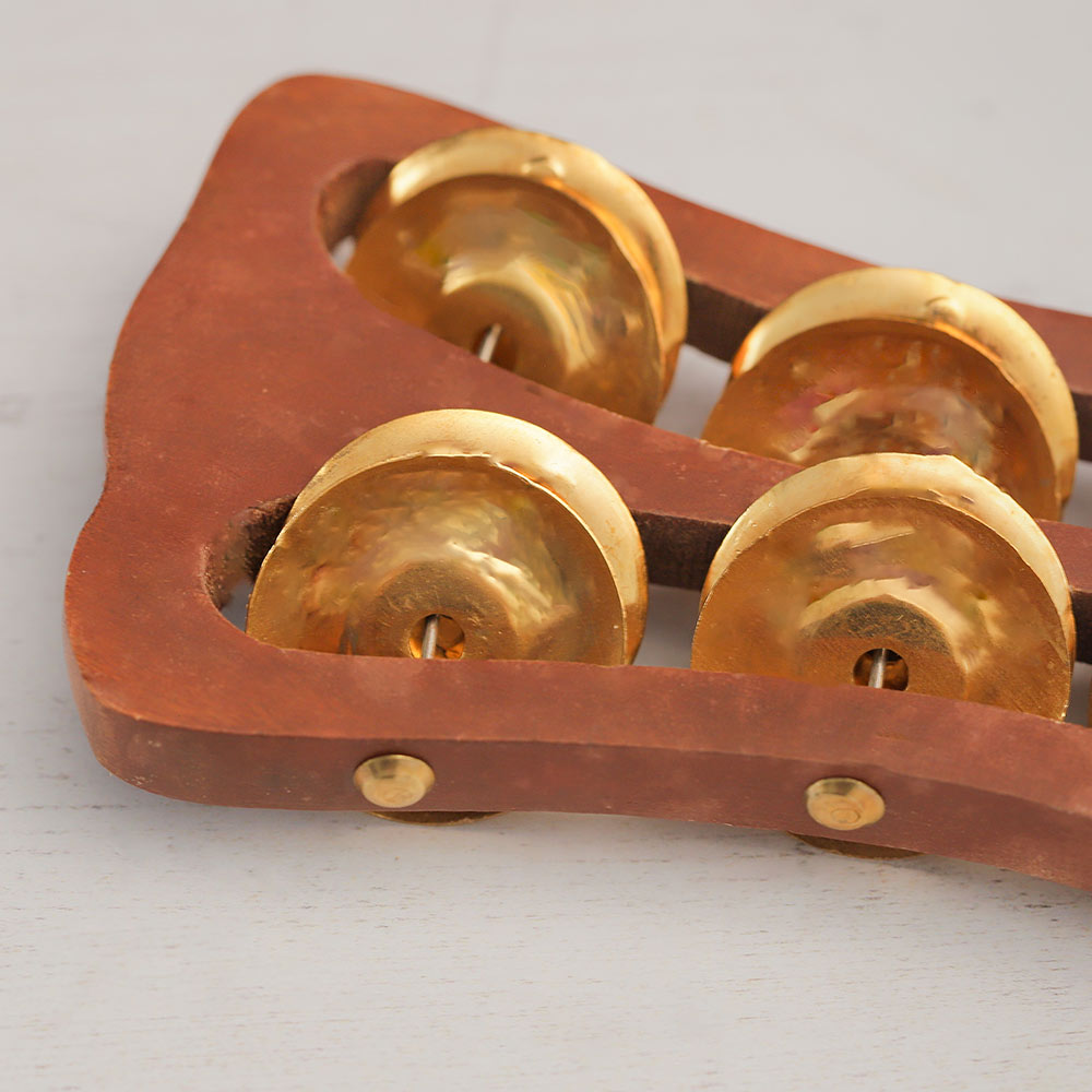 khartal shaker tambourine close up of bells
