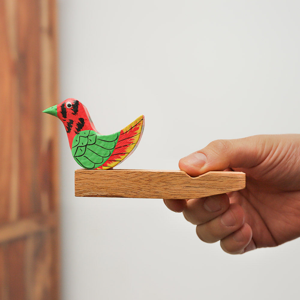 Handheld Mesari bird whistle, wooden and hand-painted, from Bali