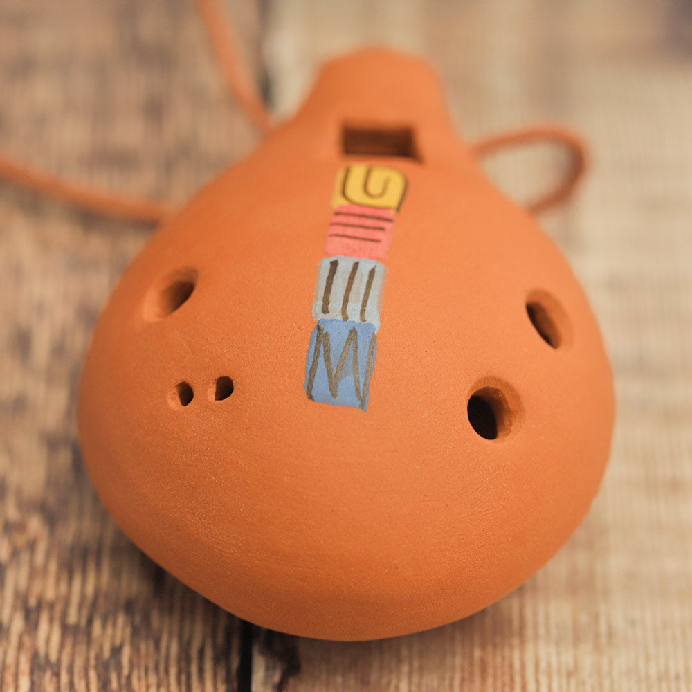 A close up of the behind of the Ocarina Pro Mezzo-Soprano