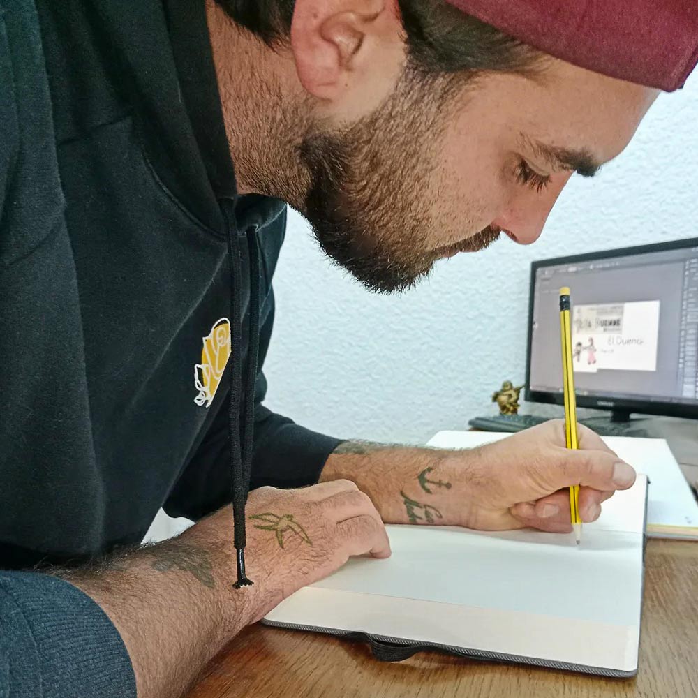 Shannon Salvatore sketching a stunning logo concept from scratch with a pencil on paper.