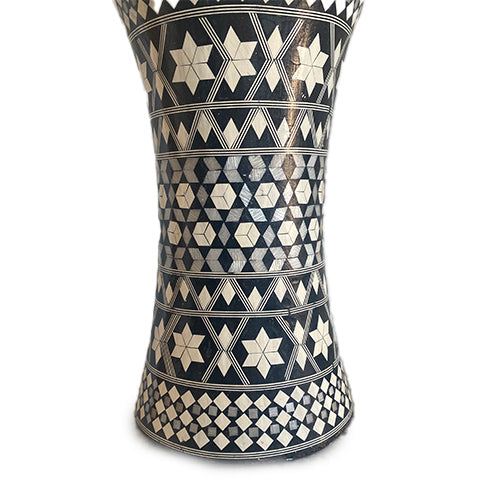 Decorative Turkish drum with geometric patterns on a white background