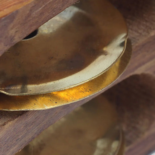 Close up of brass metal khartal bell