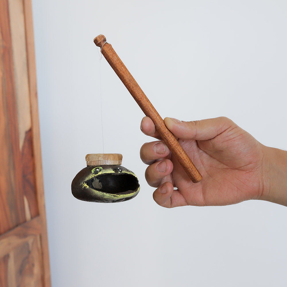 goblin frog twirler in hand