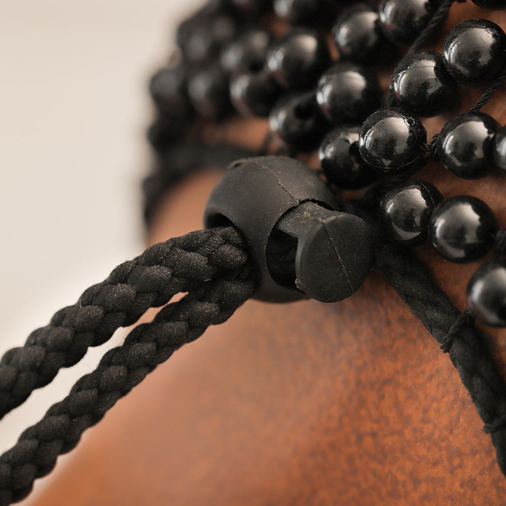 close up of extender for shekere