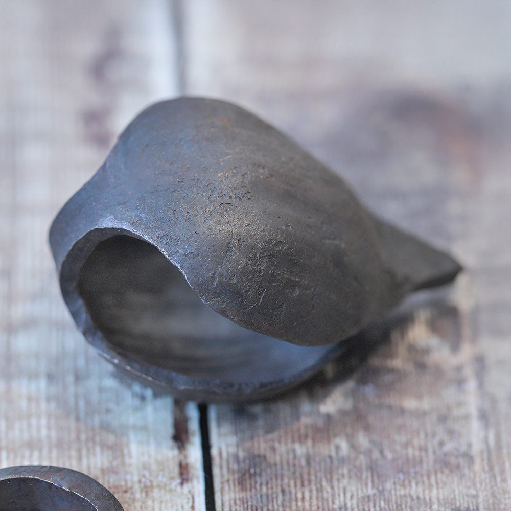 close up of grello finger bell