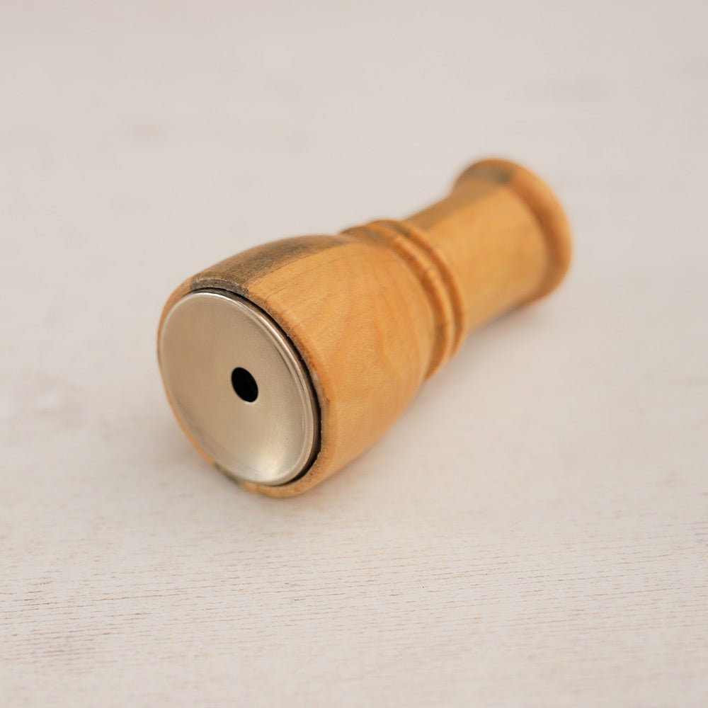 close up of side of grey partridge bird caller