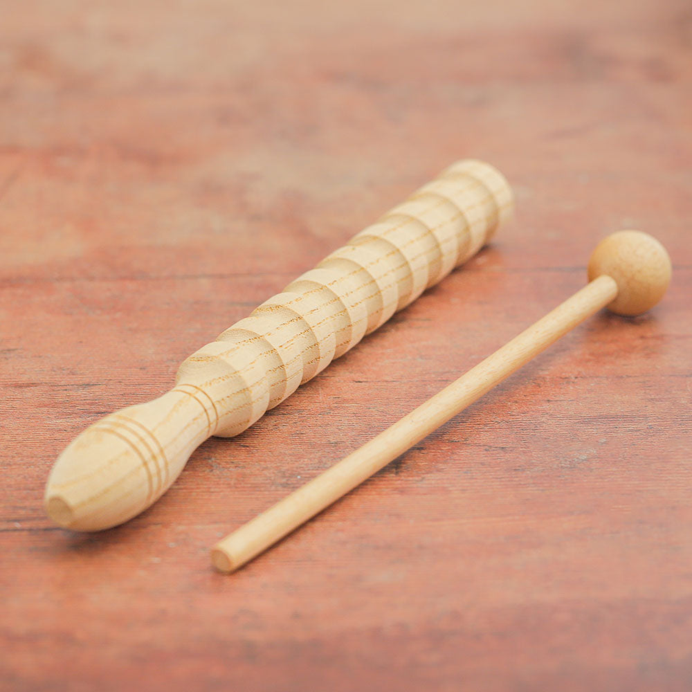 close up of morus guiro with beater