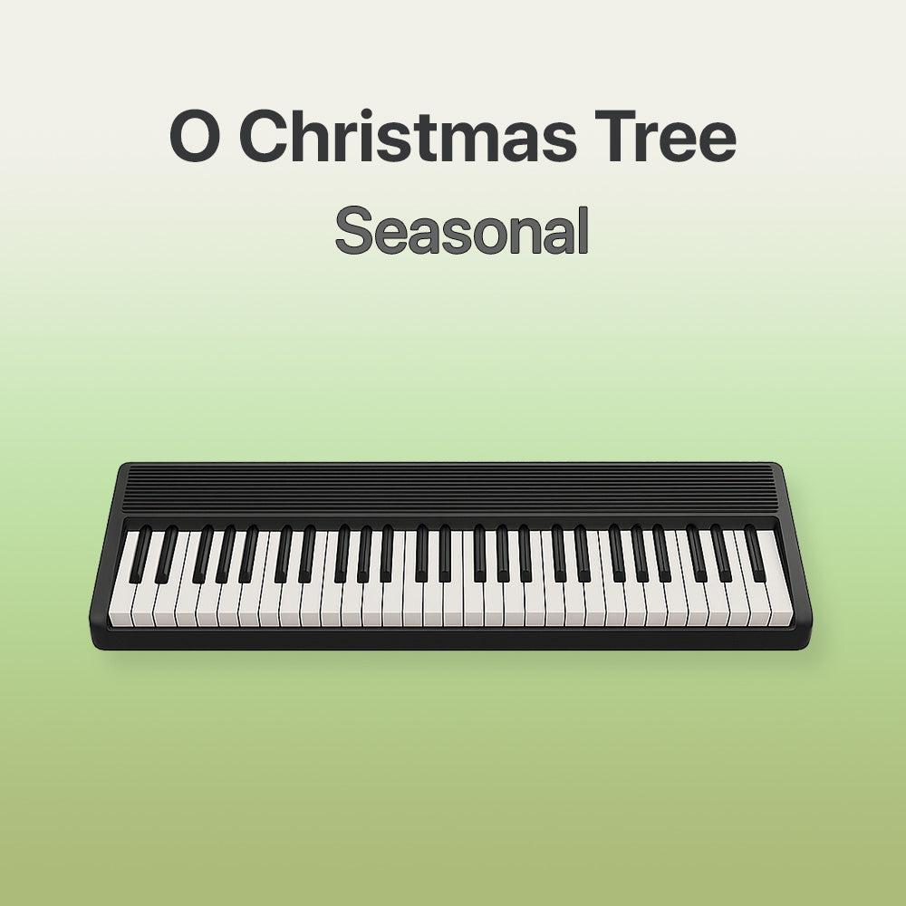Keyboard with 'O Christmas Tree Seasonal' text on a green background