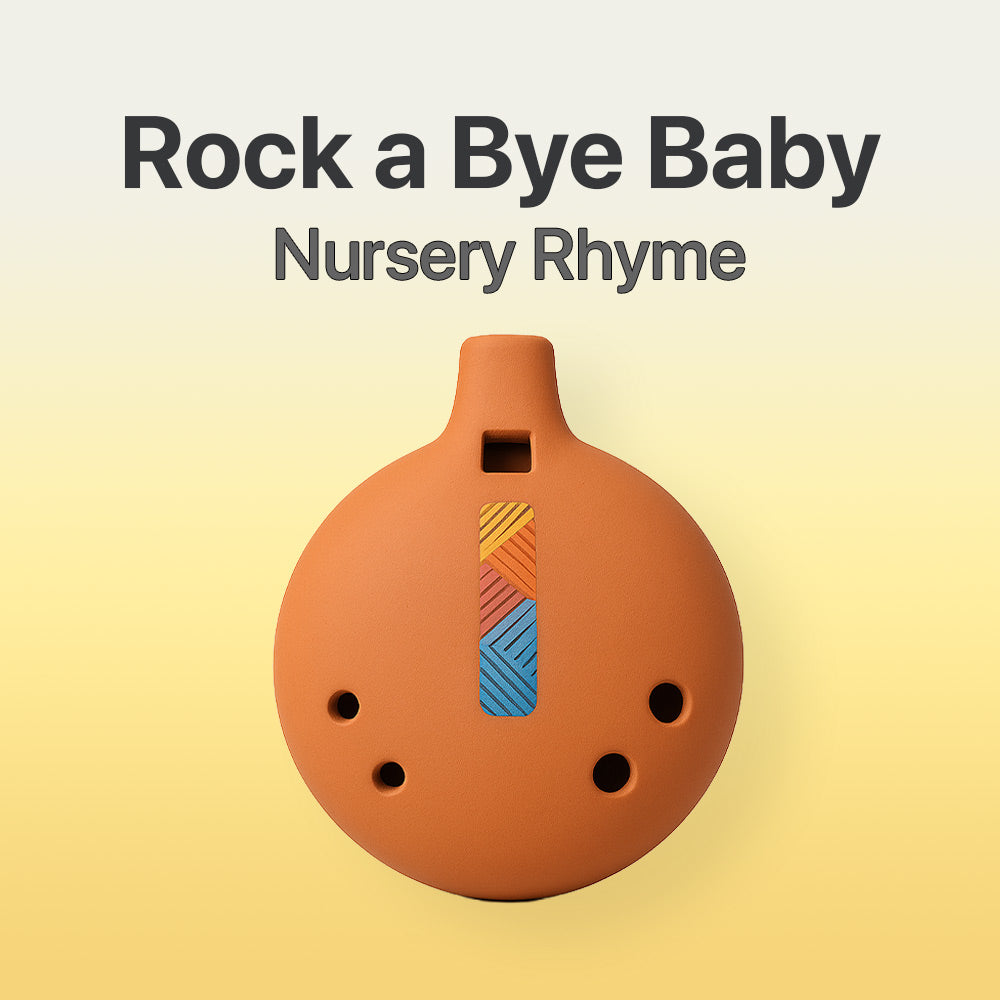 Ceramic Ocarina with colorful design on a beige background, featuring text 'Rock a Bye Baby Nursery Rhyme'.