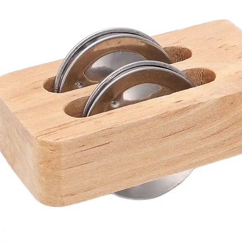 Close up of yang jingle stick metal bells