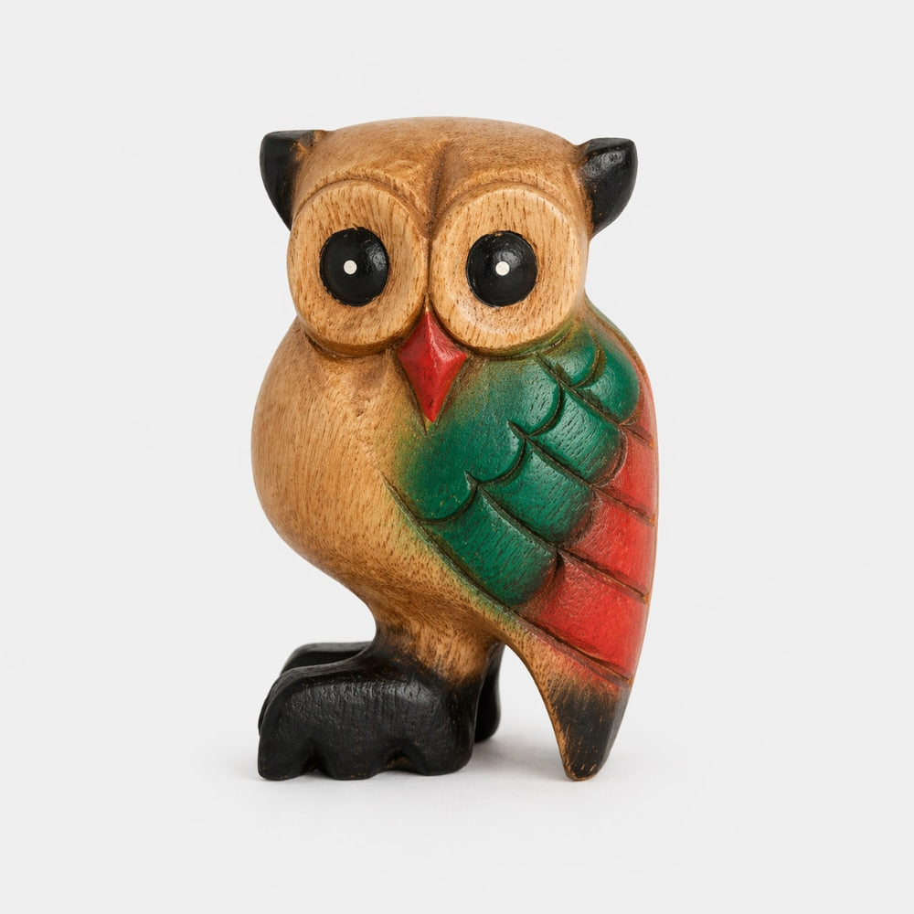 wooden owl flute with colourful features on grey background