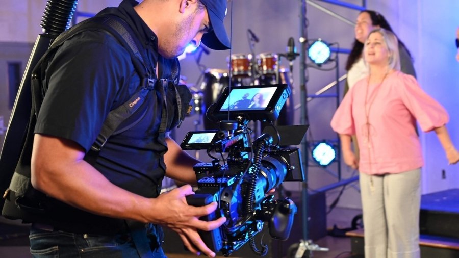 A Cameraman Taking Video