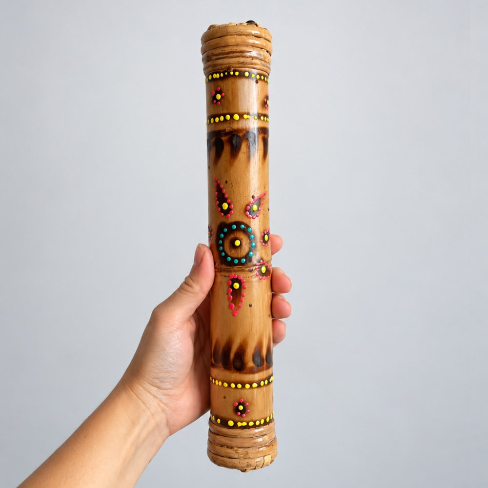 hand holding 30cm rainstick 