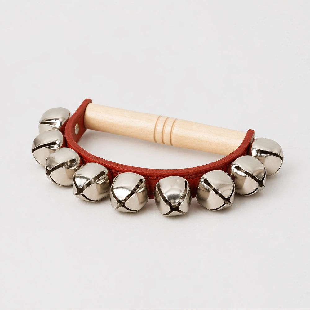 9 sleigh bells attached to leather band 