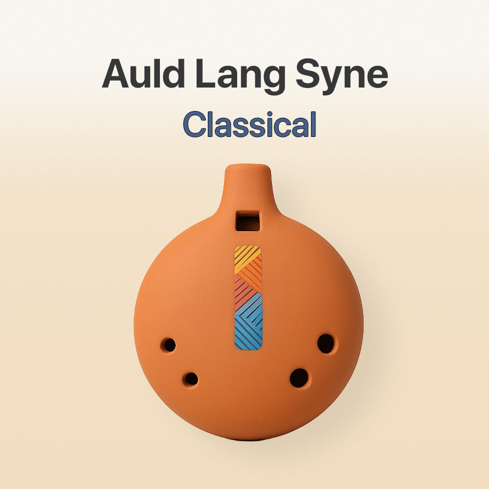 Ceramic ocarina with colorful design on a beige background, featuring the text 'Auld Lang Syne Classical'.