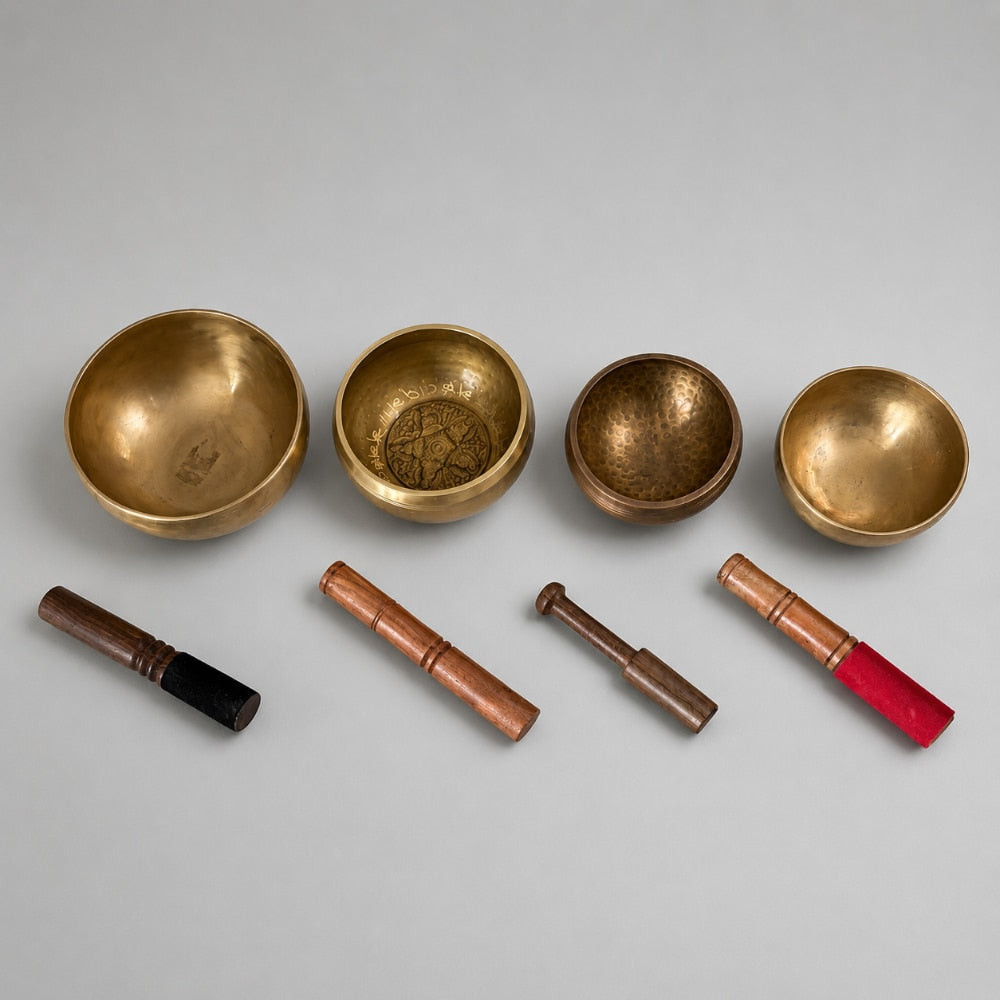 set of four mixed size singing bowls