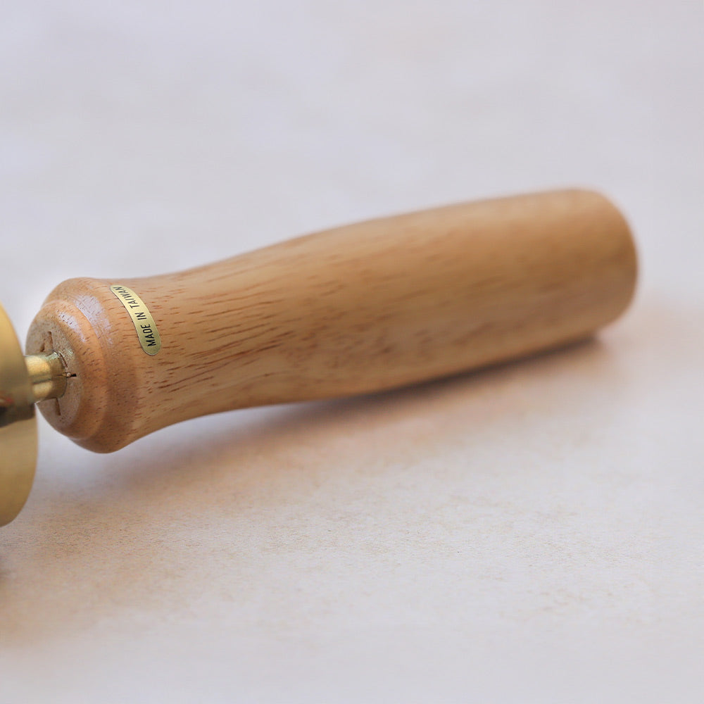 close up of chinese bell tree handle 