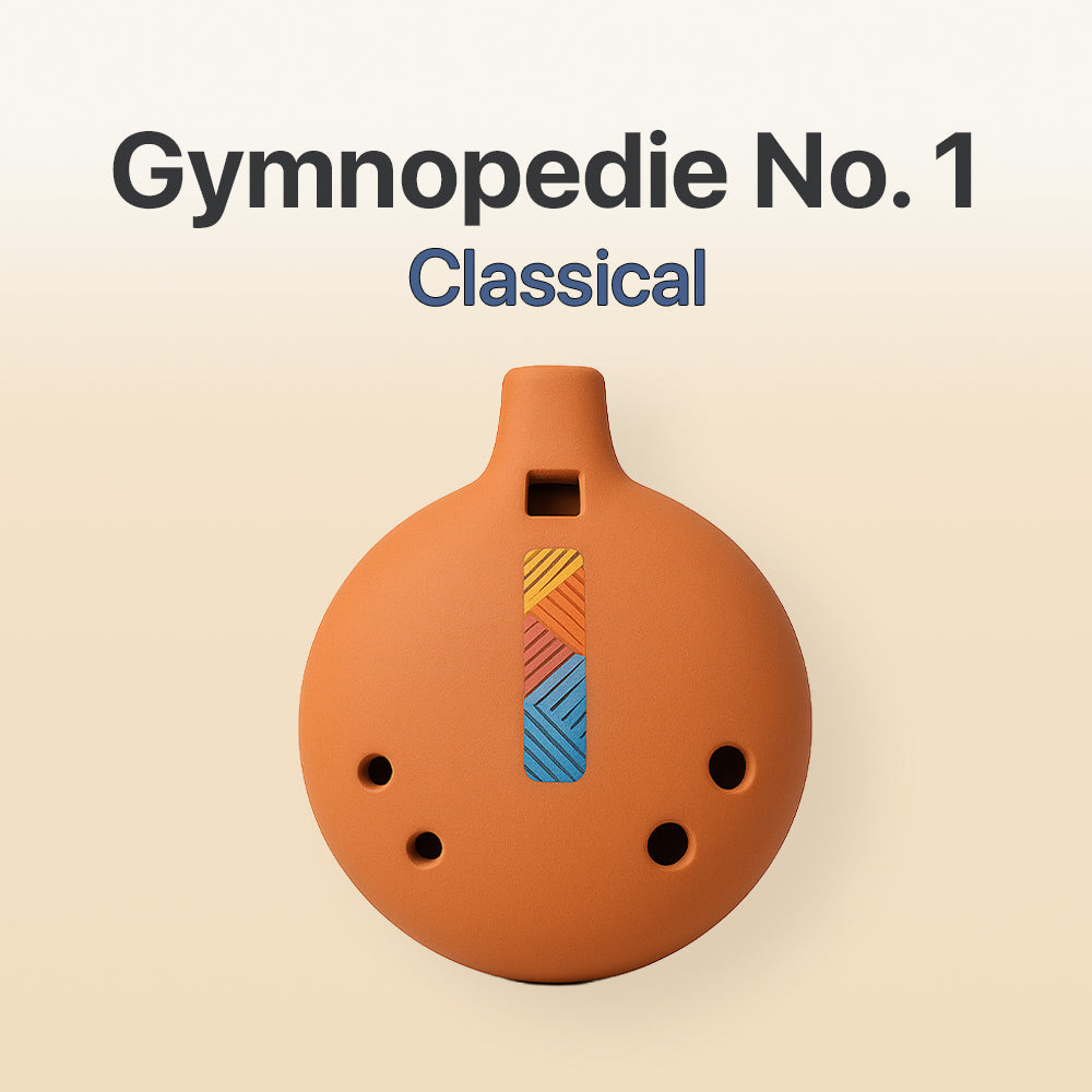 Ceramic ocarina with colorful design on a beige background, featuring text 'Gymnopedie No. 1 Classical'.
