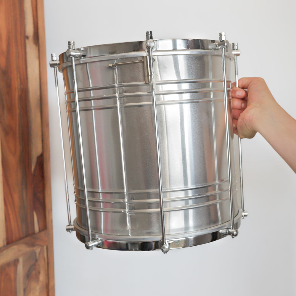 scale image in hand of samba drum 