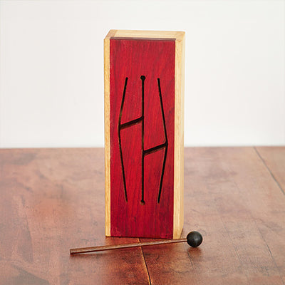 Upright Kosbaar tongue drum percussion block with beater