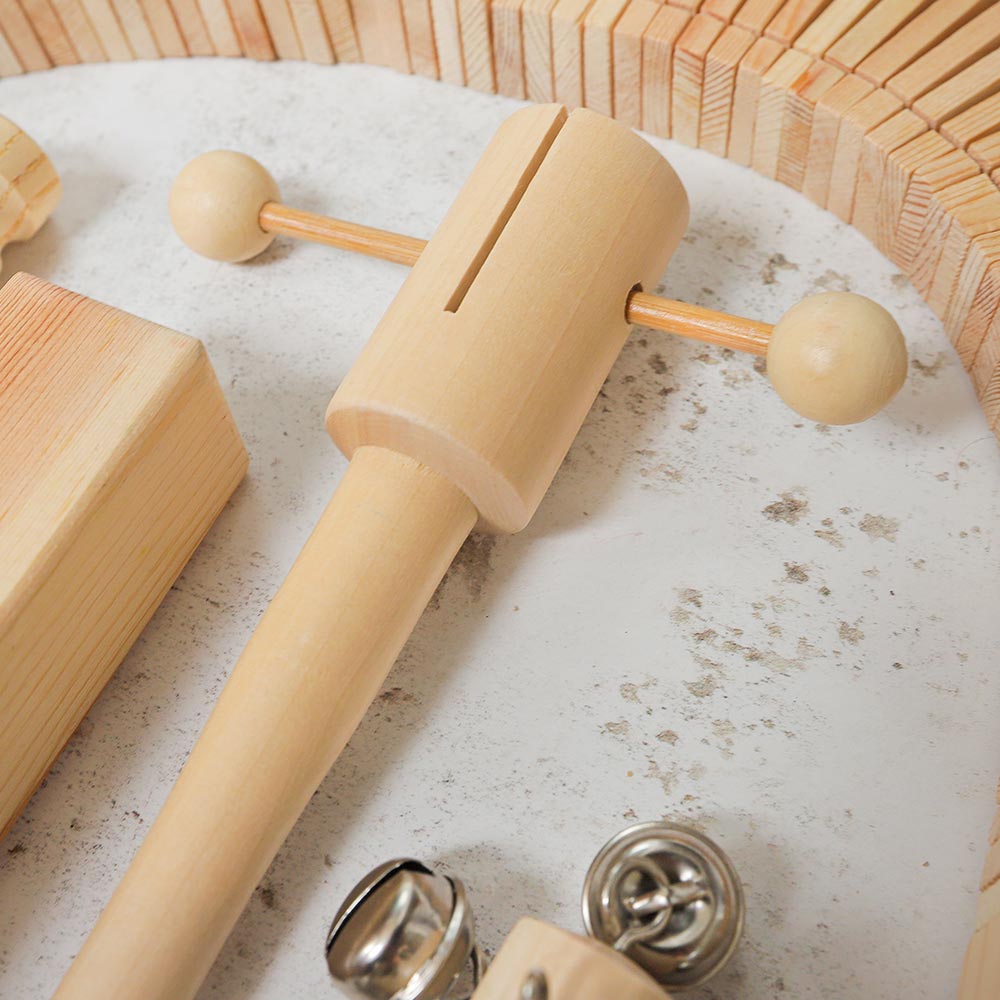 Close up of the T-clacker wooden clacking percussion instrument 