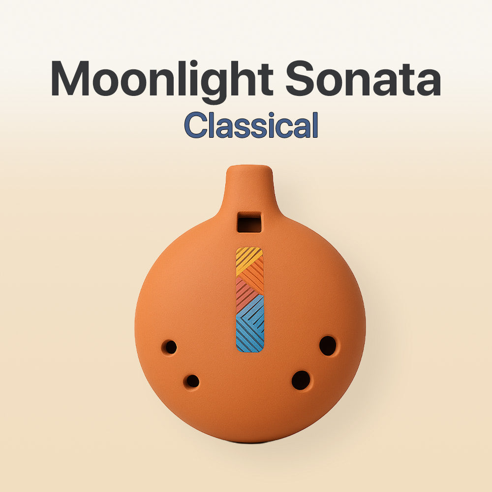 Ceramic ocarina with colorful design on a beige background, labeled 'Moonlight Sonata Classical'.