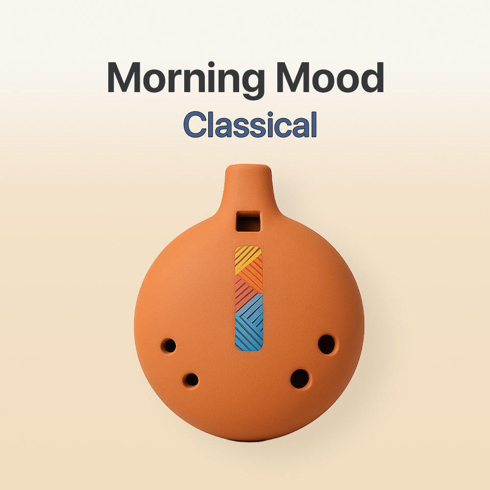 Ceramic ocarina with colorful design on a beige background, labeled 'Morning Mood Classical'.