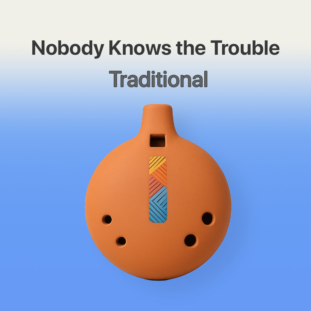 Terracotta-colored ocarina with colorful design on a blue background, text 'Nobody Knows the Trouble Traditional' above.