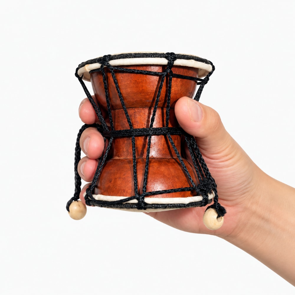 damaru twist drum in hand
