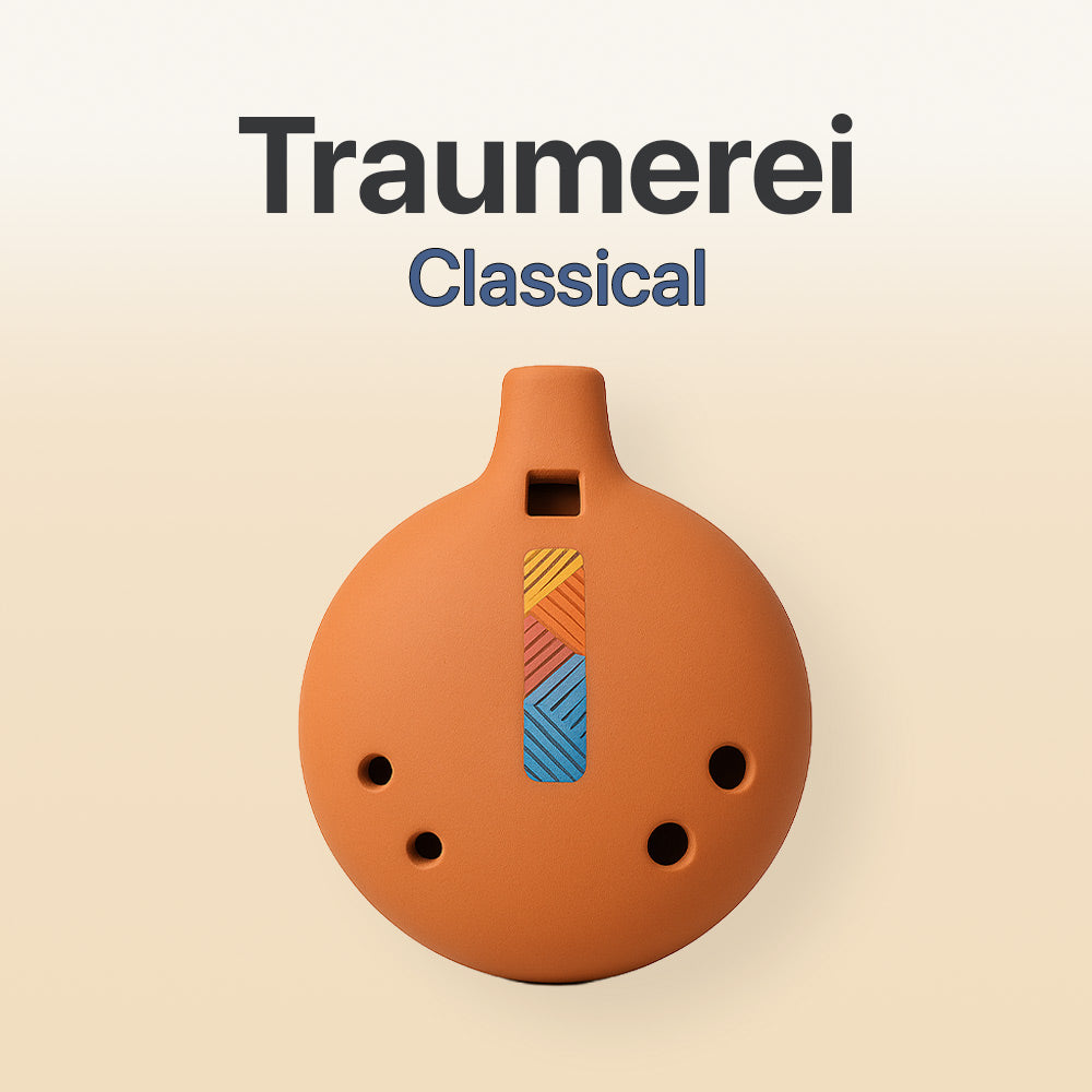 Ceramic ocarina with geometric design on a beige background, featuring the text 'Traumerei Classical'.