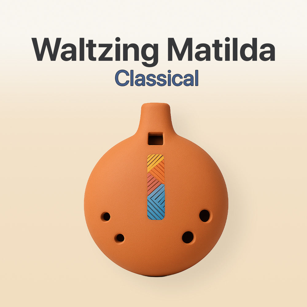 Ceramic ocarina with colorful design on a beige background, featuring the text 'Waltzing Matilda Classical'.