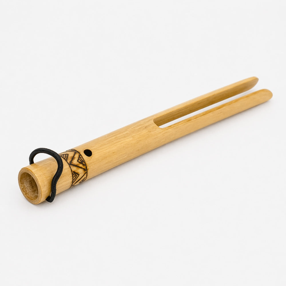 bamboo buzzer with black handle on grey background