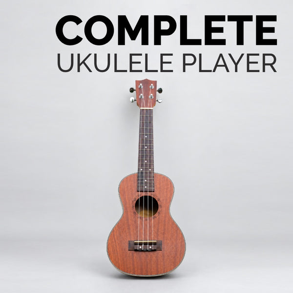 Book titled 'The Complete Ukulele Player' by Ryan Bomzer with a ukulele and flowers on a light gray background