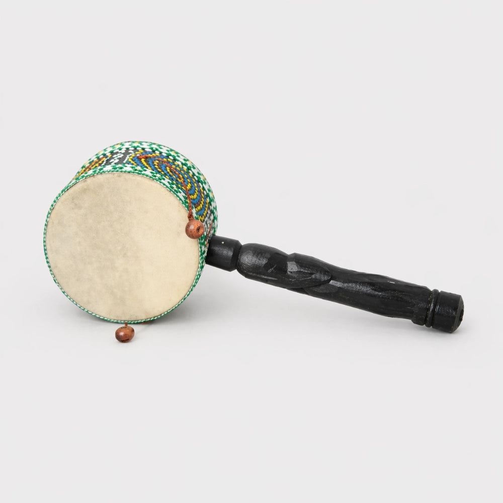 dot painted ontong drum with black handle