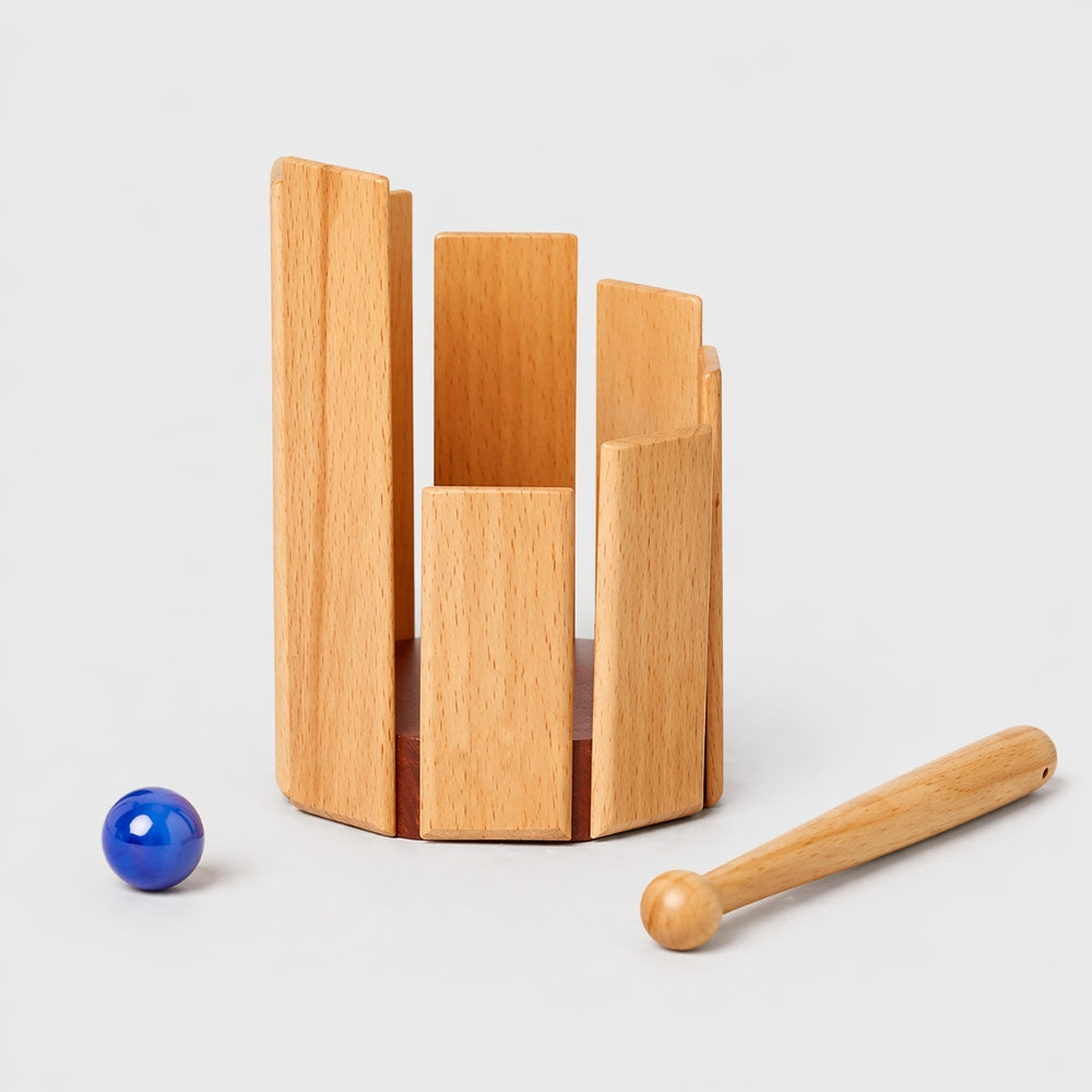 xylophone with marble and beater