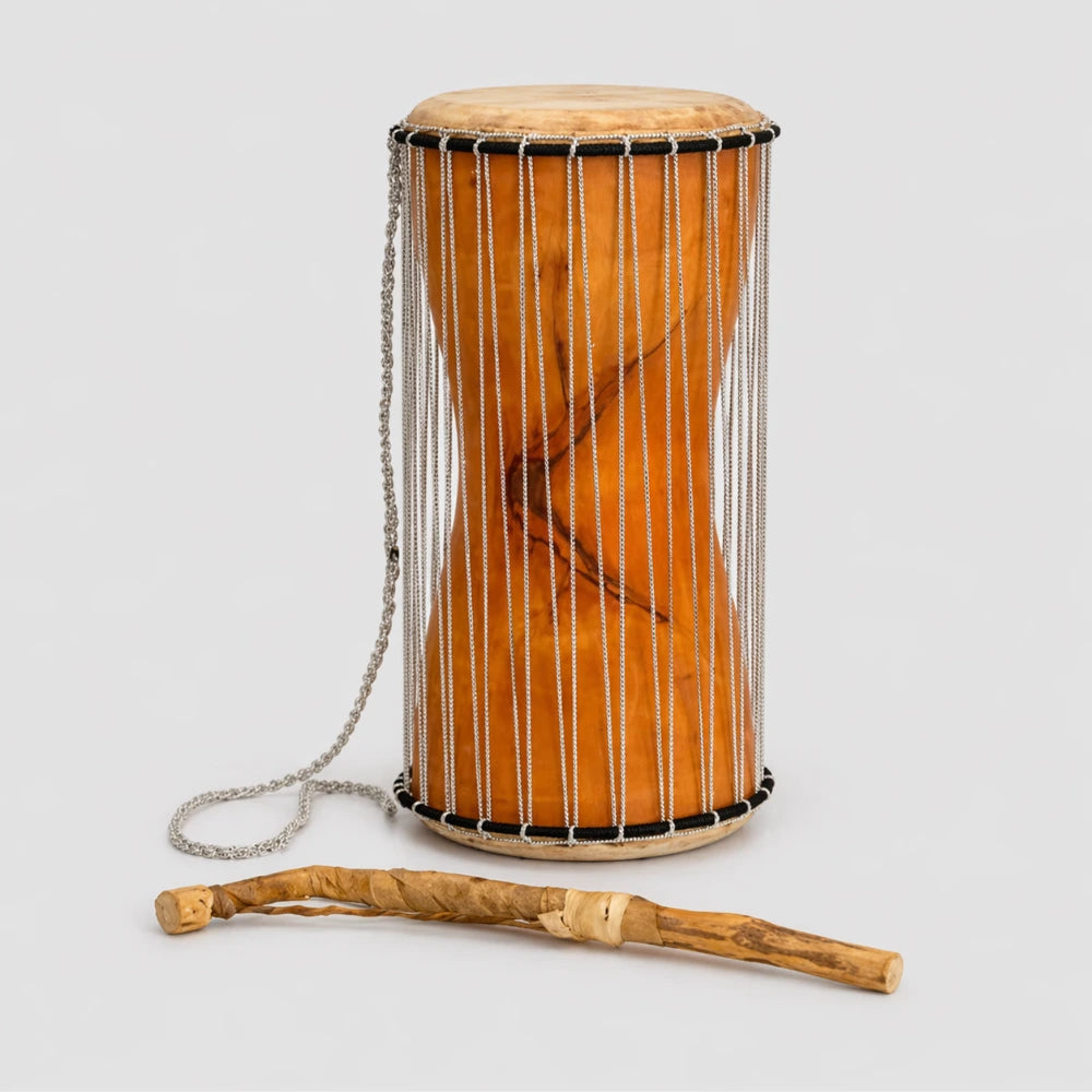 Traditional African talking drum with beater
