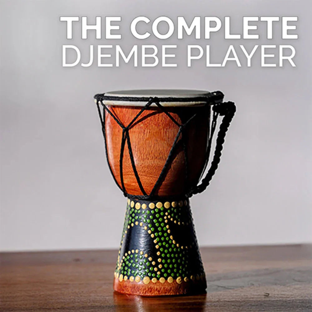 Djembe drum with decorative base on a wooden surface, text 'THE COMPLETE DJEMBE PLAYER' above.