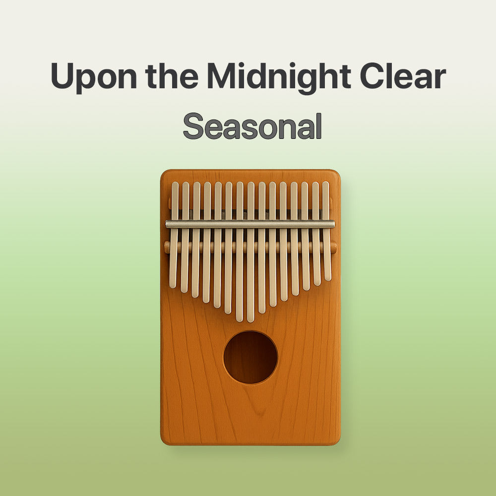 Wooden kalimba with 'Upon the Midnight Clear Seasonal' text on a light green background