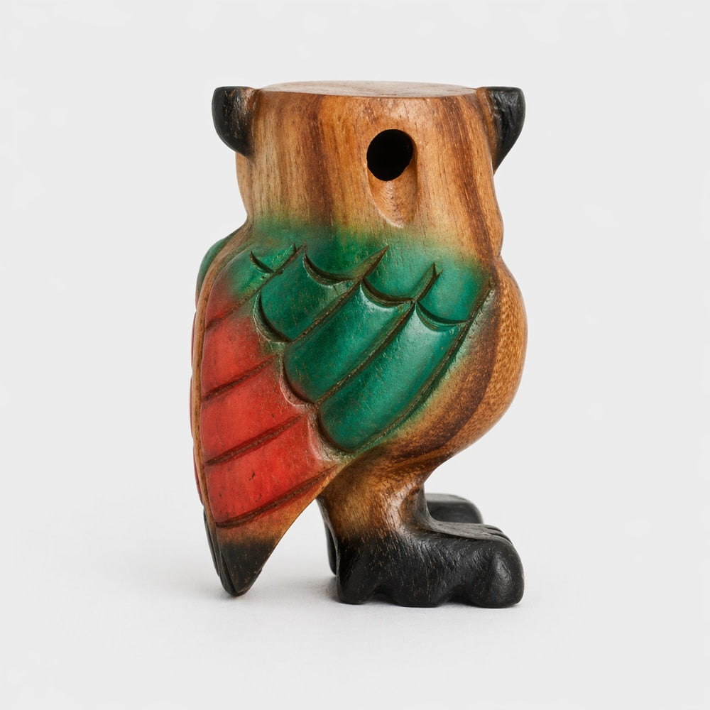 back of wooden owl flute 